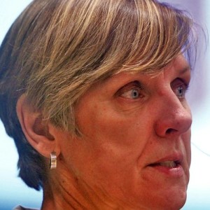 Woman speaking at a conference.