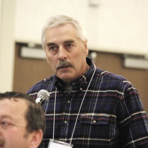 Man speaking at microphone