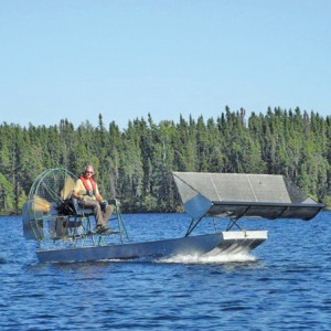 airboat with a hopper for harvesting wild rice