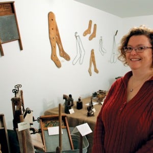 woman with antique ironing equipment