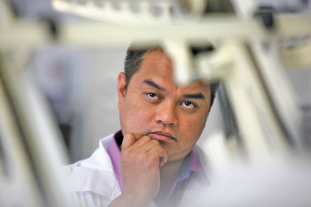 Darwin Tatel of the San Miguel Mill in Batangas, Philippines examines pasta technology during a technical exchange at Cigi.
