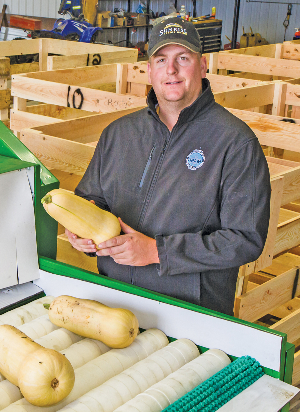 Bryce Lobreau has just taken delivery of a new squash washer and grates to assist with preparing the harvest for delivery to Canadian Prairie Garden Puree.