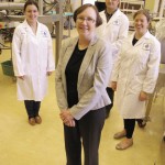 Linda Malcolmson, Cigi’s manager of special crops, oilseeds and pulses says the establishment of a pulse-processing facility and the skilled team operating it is one of the things she’s most proud of from her time at Cigi. That team includes technologist (l) Gina Boux, and project managers Peter Frolich and Heather Maskus. Lindsay Bourre, a technical specialist (not pictured) is also part of Cigi’s pulse team. Photo: Lorraine Stevenson