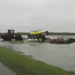Three to five inches of rain hit farmers in the Miami, Thornhill and Darlingford area May 30 and 31. The same region received three to 10 inches on the May long weekend. Run-off from the saturated fields caused soil erosion, washed out roads and culverts and flooded parts of Morden.  photo: Donna Cox