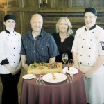 Clinton and Pamela Cavers, centre, were the 2013 gold medalists in the Great Manitoba Food Fight for their pastured pork prosciutto created in their on-farm meat shop. The Cavers were teamed up with Assiniboine Community College’s Manitoba Institute of Culinary Arts student team Maggie Delaurier (l) and Justin Black for the competition.  photo:rob Lovatt / Keywest photo /i mage by design inc.