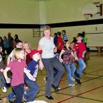 line dancing schoolchildren