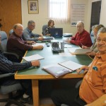 council seated at a table