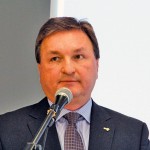 Man talking into microphone.