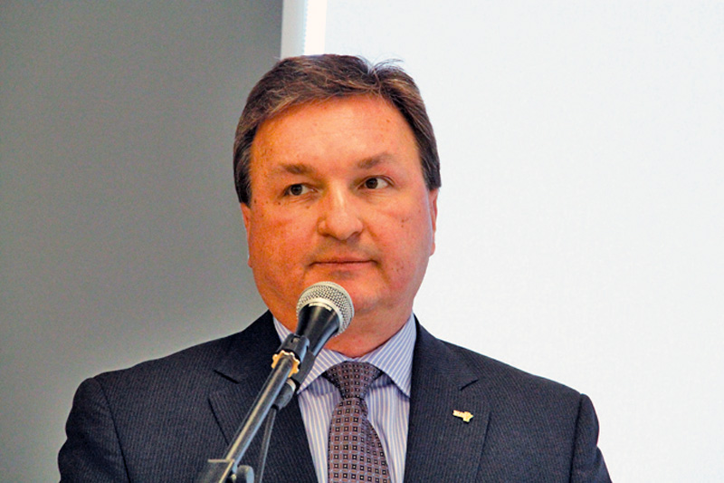 Man talking into microphone.
