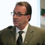 Man speaking into microphone.