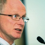 Man speaking into microphone.