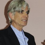 Man speaking into microphone.