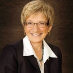 Mature woman smiling.