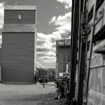 Black and white photo of a prairie grain elevator.