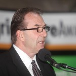 Man speaking into microphone.