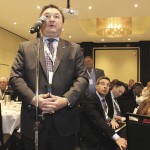 Man speaking into microphone.