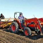 planting flax seed with a tractor