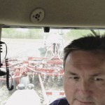 Man in tractor cab
