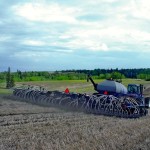 farmer seeding a field