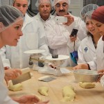 International guests learn how to make durum bread.