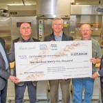 Rex Newkirk (Cigi) (l-r), Jake Davidson (executive director Manitoba and Saskatchewan winter cereals agencies), Doug Martin (Winter Cereals Manitoba), Garth Butcher (Winter Cereals Manitoba) and Earl Geddes (Cigi) in the Cigi bakery during the presentation of funding for the new Cigi Winter Wheat initiative. Missing: Jeff Jackson, Alberta Wheat Commission.  Photo: Supplied