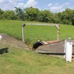 Don Cruikshanks, manager of the Deerwood Soil and Water Management Association, at a unique research site in the Pembina Hills where two watersheds meet. The location allows researchers to do comparative analysis of farm management practices related to water and nutrient management. Photo: Laura Rance