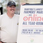 Phil Veldhuis will soon be selling his honey year round at St. Norbert’s Farmers’ Market, which is about to go online.