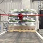 pallet of crop seed on a conveyor