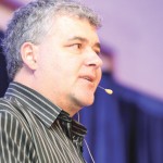 Mike Jubinville speaks about future market trends at a Farm Credit Canada event in Winnipeg.