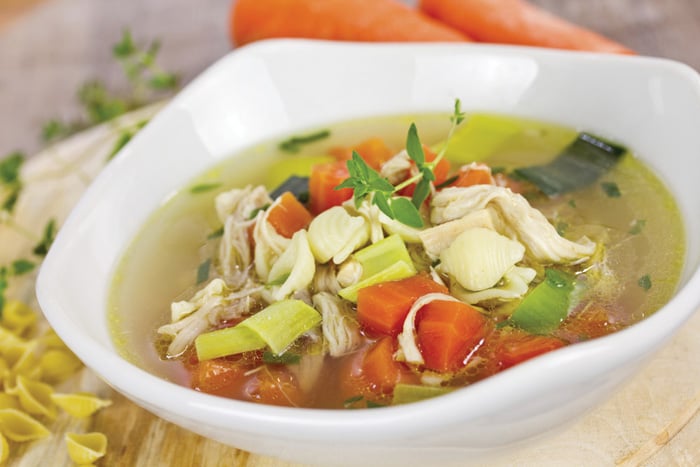 a bowl of hearty chicken soup