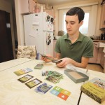 young man with card game