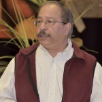 man making a presentation on stage