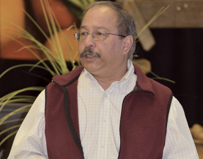 man making a presentation on stage