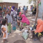 A woman sells chat in the village market in Bila.