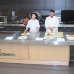 Kelsie Gardner, Glenda Halkett and Dallas Stevenson wait patiently for judging results in the Manitoba Canola Growers culinary theatre.
