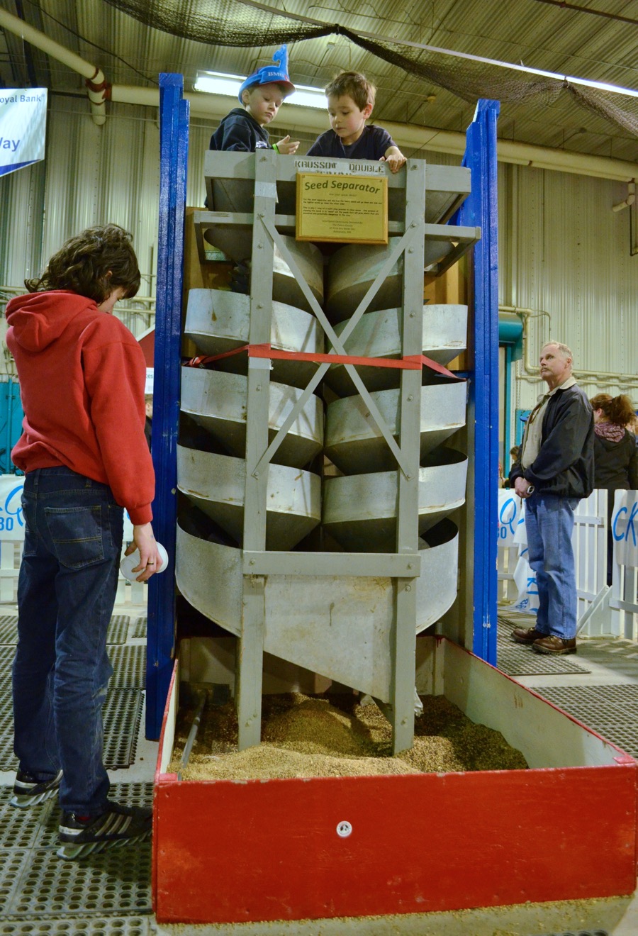 A seed separator was posed to allow attendees the opportunity to try out the first step in the multi-step process of cleaning seeds.