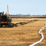 installing drainage in a field