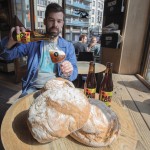 Sebastien Morvan, one of the founders of microbrewery Brussels Beer Project, displays bread and serves a beer called Babylone at Barbeton bar in central Brussels.