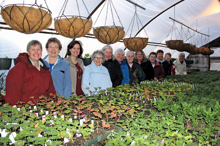 women in a greenhouse