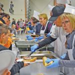 Volunteers along with a number of cattle industry members participated in serving up Canadian beef to military families at CFB Shilo.