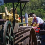 Bruce Brown of Portage la Prairie, Man. polishes up his 1964, 97 Massey-Harris prior to the daily parade.