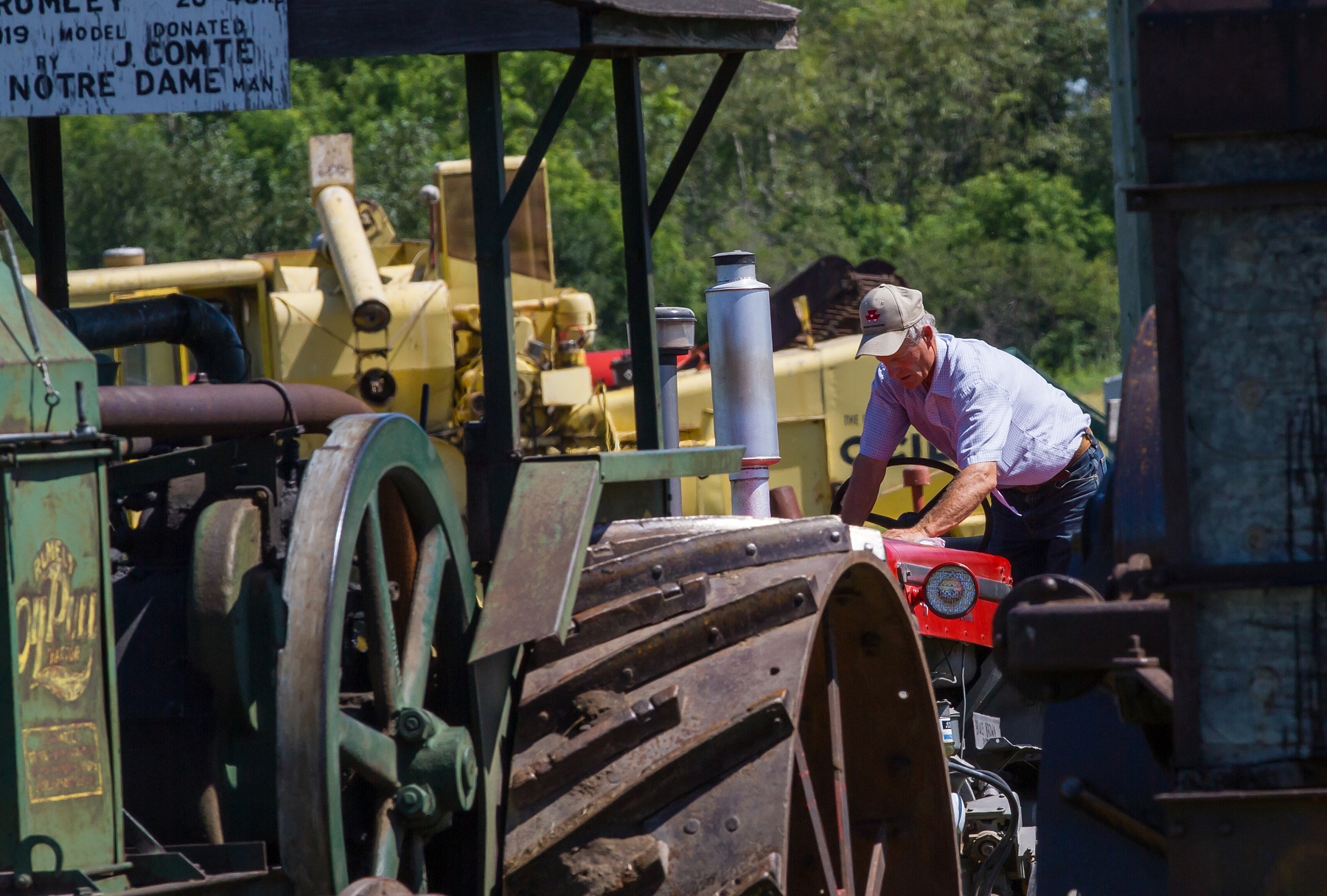 Bruce Brown of Portage la Prairie, Man. polishes up his 1964, 97 Massey-Harris prior to the daily parade.