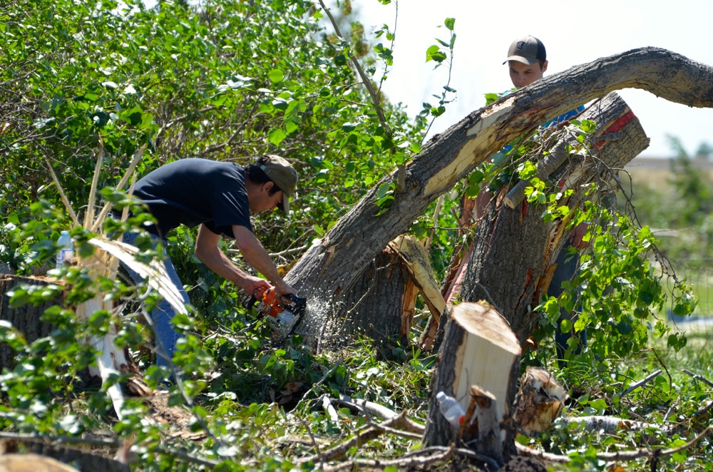 Fred and Anne Raynor’s children and grandchildren worked to clean up after the storm on Wednesday afternoon.