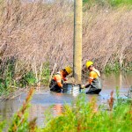 Manitoba Hydro crews worked through some soggy conditions along highway 256 as they restored power to the area’s residents.