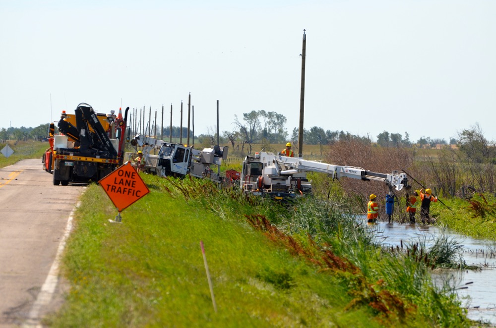 Manitoba Hydro crews worked through some soggy conditions along highway 256 as they restored power to the area’s residents.