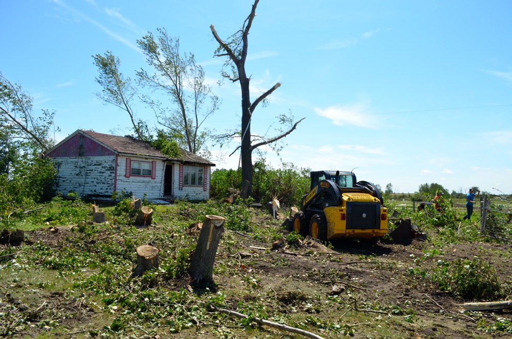 More than a dozen trees were uprooted on the Raynor couple's property.