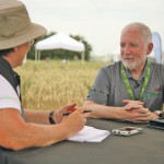 Neal Gutterson (r), head of biotech for DuPont Pioneer says new tools are speeding up the crop improvement process.