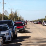 Cars line the roadway as visitors take in Open Farm Day.