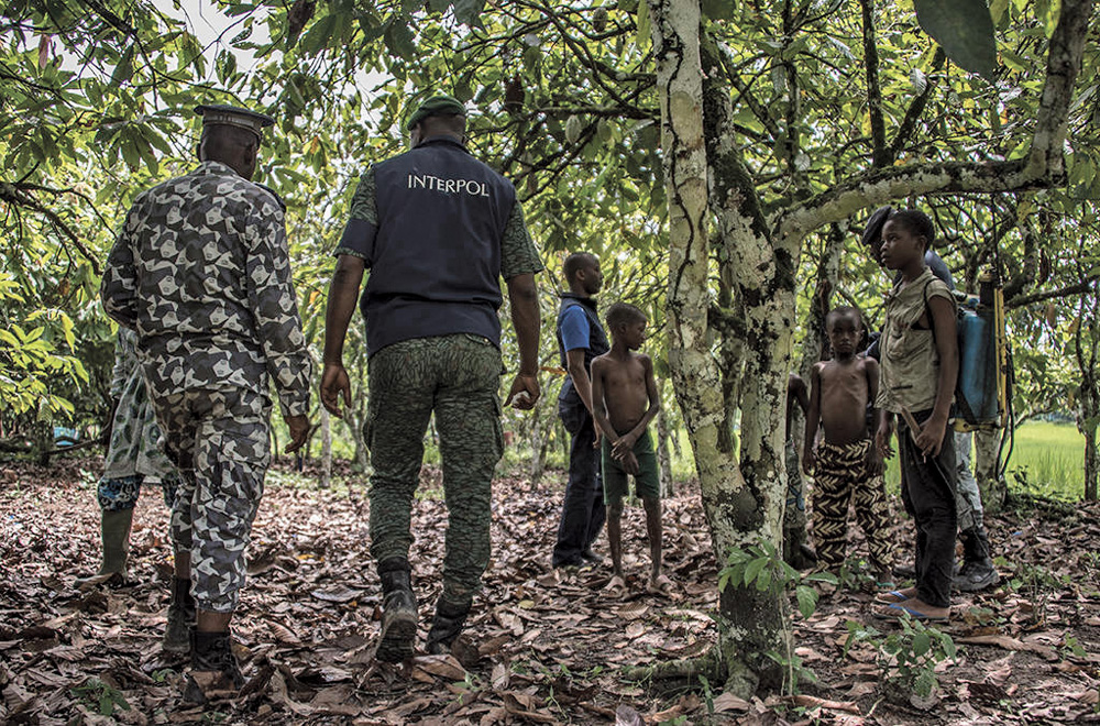 The International Criminal Police Organization (INTERPOL) rescues children, who were the victims of child trafficking, from cocoa fields in Cote d’Ivoire in June.
