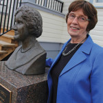 Manitou resident and history teacher Bette Mueller, next to the bust of Nellie McClung located on the grounds of the Manitou Opera House, is part of the Nellie McClung Foundation, a group raising awareness through educational events and resources about the contributions of the famous right-to-vote leader. McClung lived in Manitou until 1911 where she wrote the first of her 16 books, Sowing Seeds in Danny, and began her lifelong dedication to improving the political and social well-being of women. 